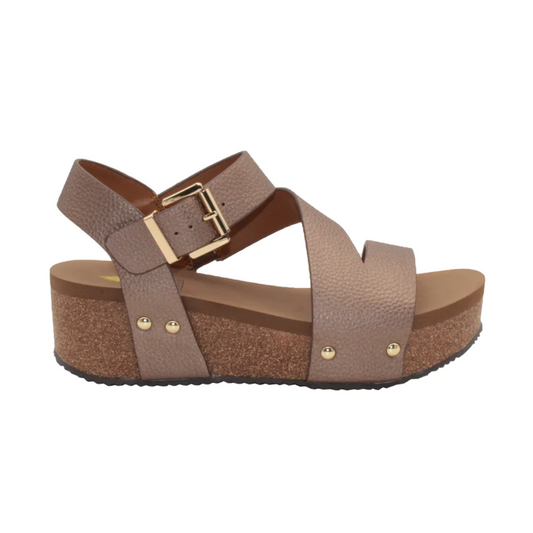 A single bronze vegan leather platform sandal with a buckle strap, the Biloxi in Bronze by Volatile Sandal.
