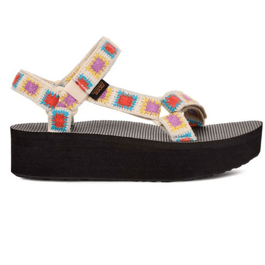 Flatform Universal Crochet Explore TEVA SANDAL sandal with colorful embroidered straps and a black sole, ideal for festival wear by Deckers.