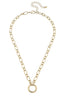 The Sasha Charm Necklace Base in Shiny Gold from Canvas Style features oval links with a large central circular pendant, and includes an adjustable clasp and extension chain.