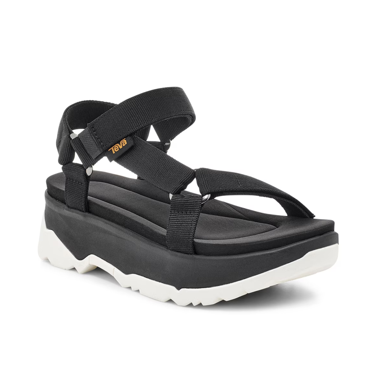 The Jadito Universal Sandal in Black by Deckers, features a thick white sole, adjustable straps, a subtle platform, and is made from recycled plastic.