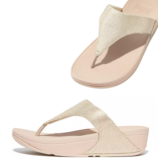 A comfortable pair of FITFLOP USA LLC Lulu Glitz flip flop sandals in Platino metallic gold finish.