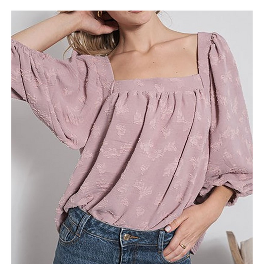 A woman wearing a Square Neck Balloon Sleeve Blouse in Mauve by FASHION GO.