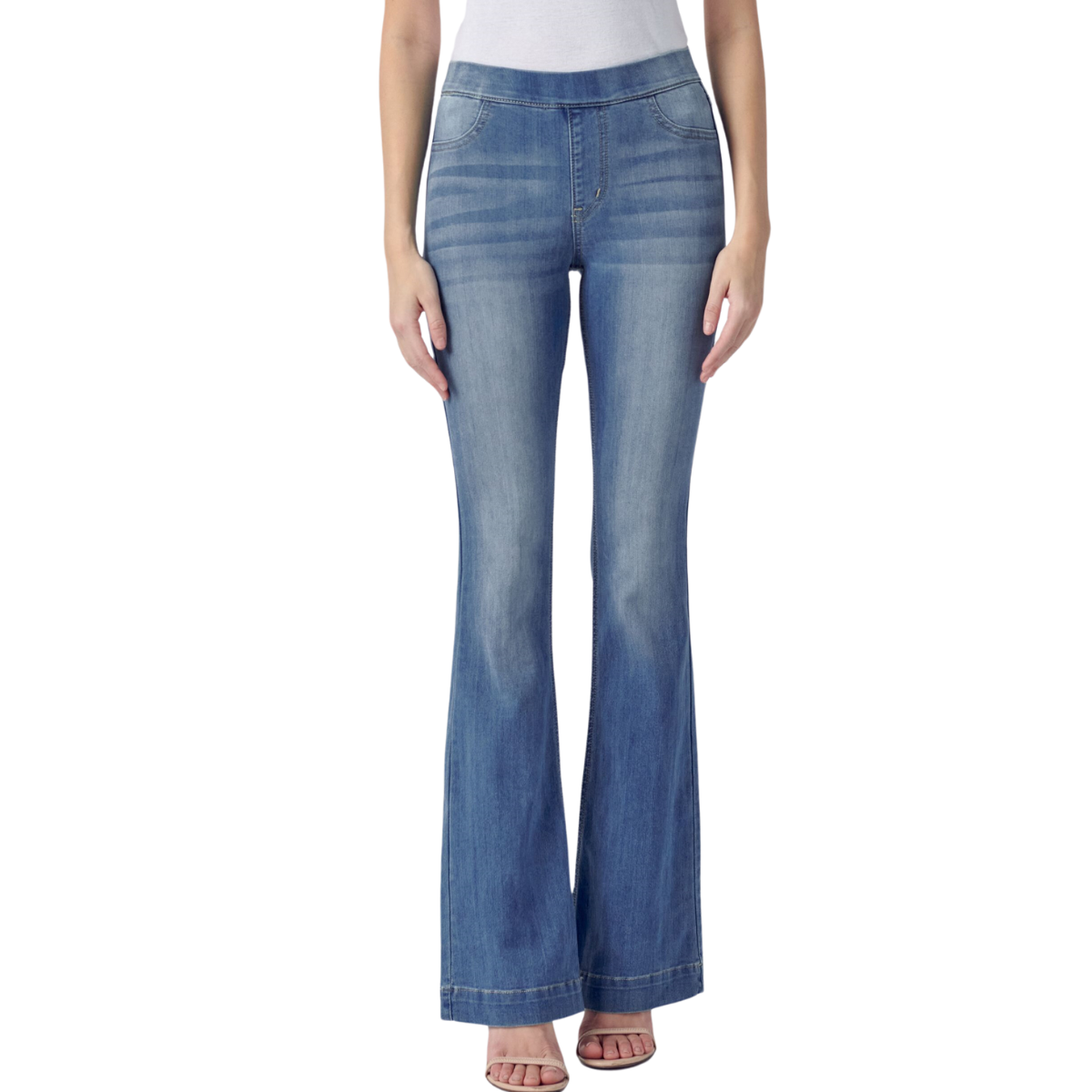 Woman wearing cello pull on mid rise flare jeans 33 inch inseam medium denim standing with hands out of frame.