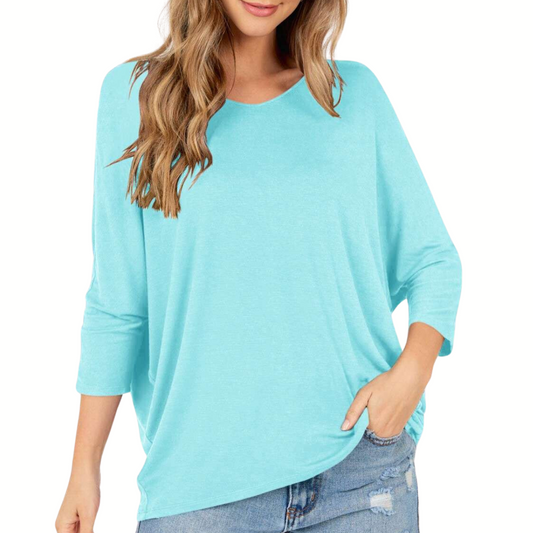 Woman wearing a casual Aqua Blue Mint Knit 3/4 Sleeve Top with a V-neck and three-quarter sleeves by FASHION GO.