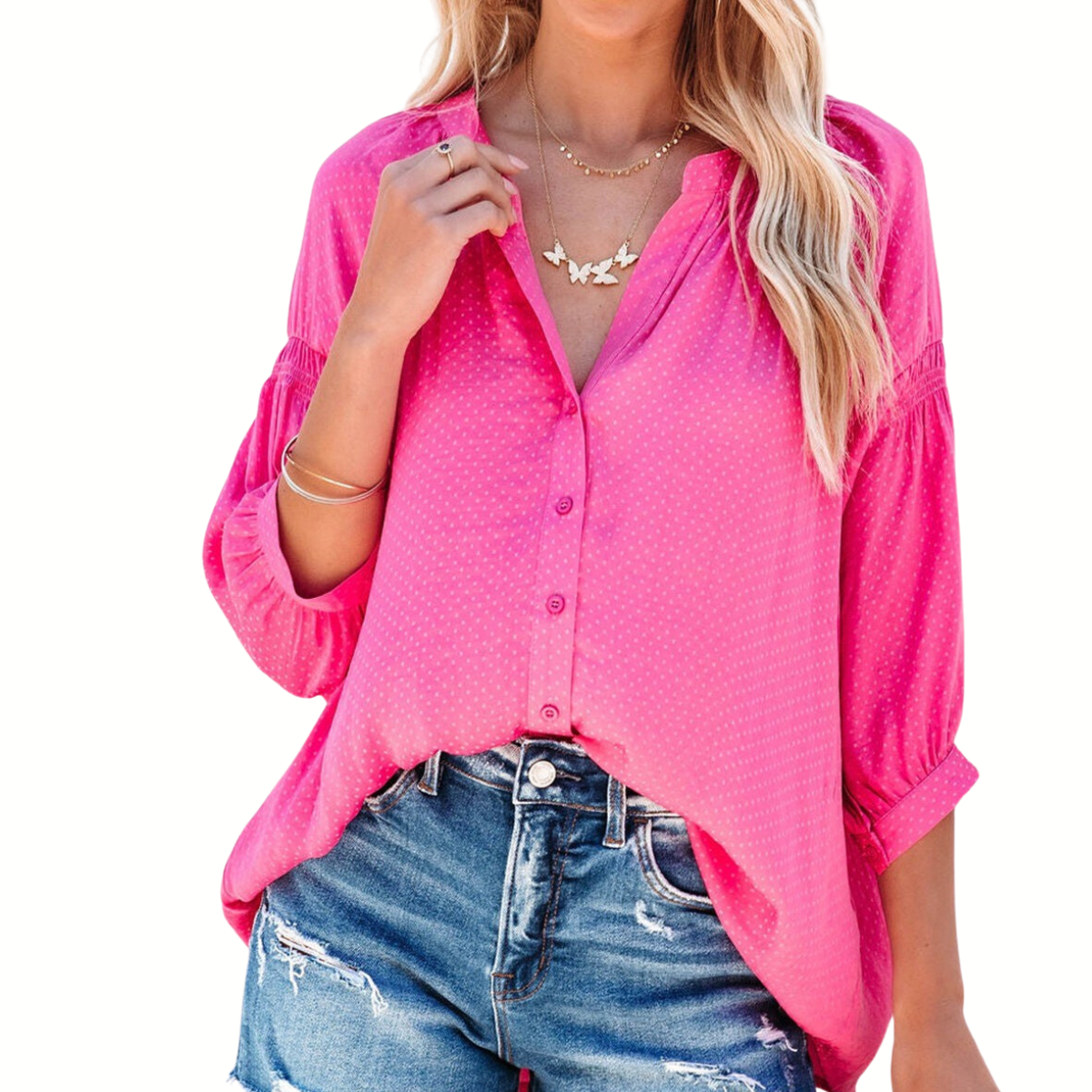 A woman wearing a Think Pink Dotted Shirred Blouse with a V neckline and denim shorts by FASHION GO.