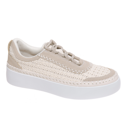 Side view of a Shauna Sneaker in Cream by OLEM SHOE CORP with a woven look and white sole.