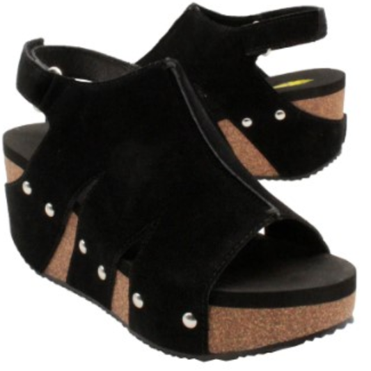 A pair of Volatile Montpelier black suede wedge sandals with ankle straps and cork soles.