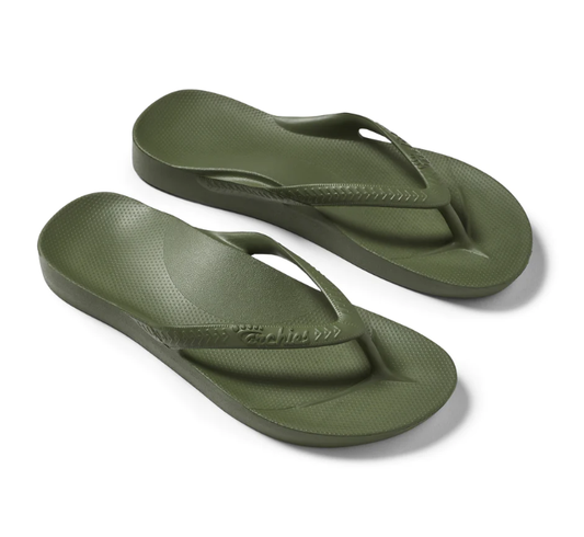 A pair of khaki ARCHIES Flip Flops by ARCHIES FOOTWEAR LLC on a white background.