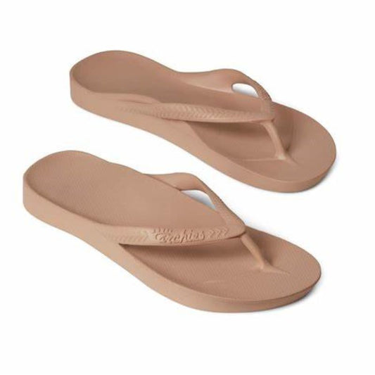 A pair of biomechanically appropriate ARCHIES Flip Flops in TAN on a white background from ARCHIES FOOTWEAR LLC.