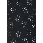 The Leggings Depot Buttery Soft Print Pajama Pants feature black fabric with a cute repeating pattern of simple white cat faces and an elastic waistband for maximum comfort.