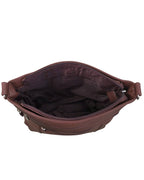 The Roma Leathers, Inc. Cowhide leather crossbody features an open view of its empty, fabric-lined interior, zippered closure and pockets, plus an adjustable shoulder strap.