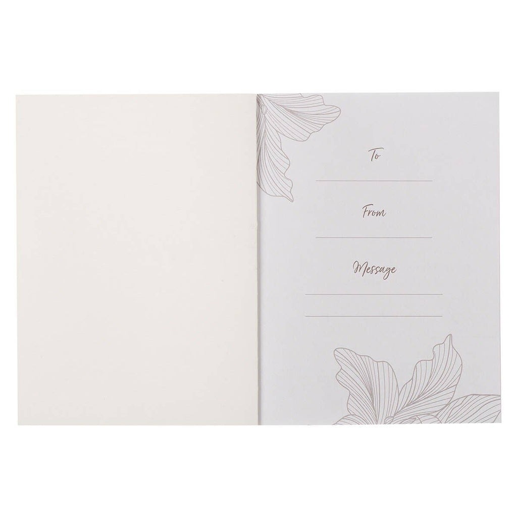 Open the One-Minute Devotions for Women Softcover greeting card by Christian Art Gifts to reveal outlined floral designs and designated spaces for “To,” “From,” and “Message” on the right page—ideal for personal devotional notes or pairing with one-minute devotions. The left page is blank.
