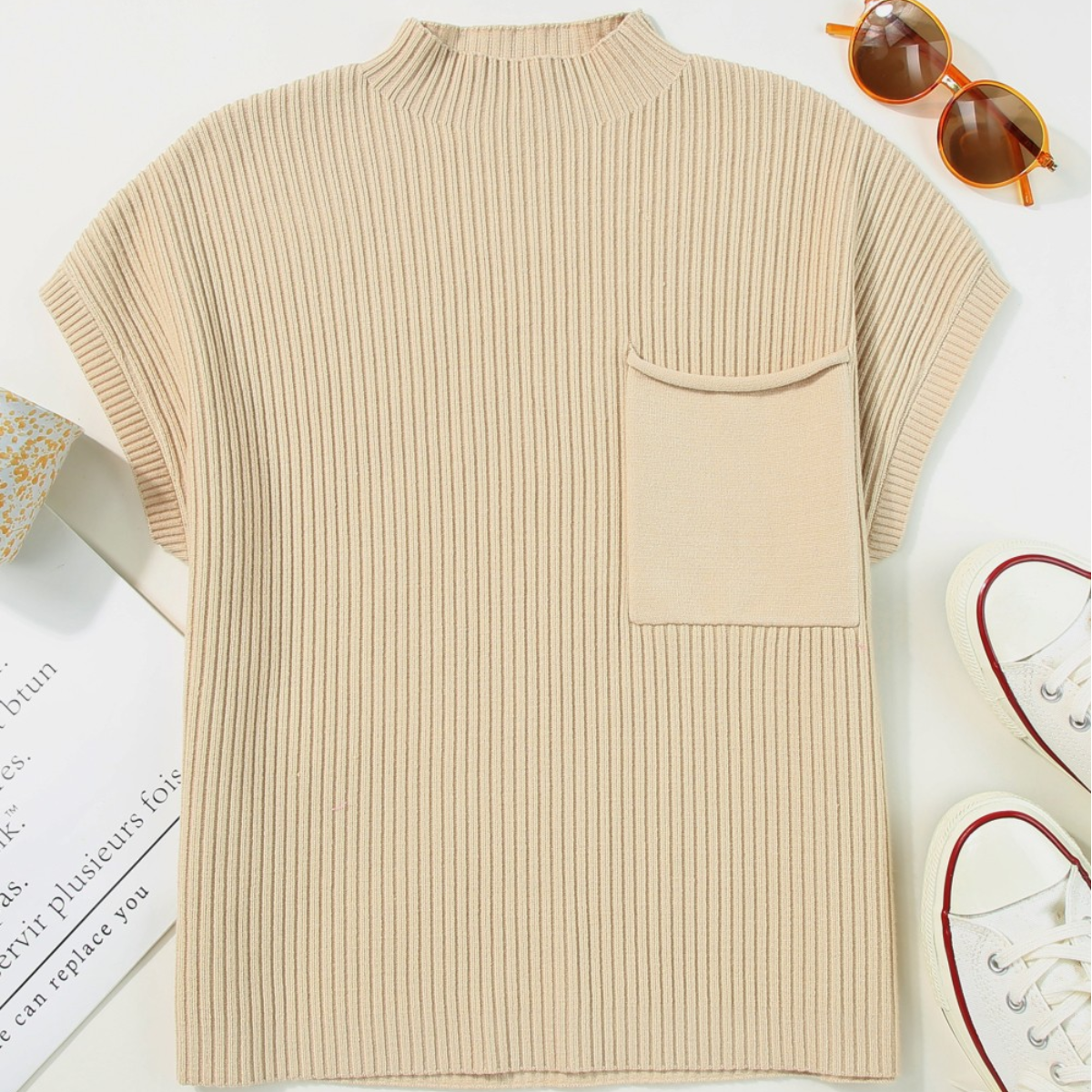 A beige mock neck sweater with a ribbed knit and a Patch Pocket Ribbed Knit Short Sleeve Sweater - Apricot next to it by FASHION GO.