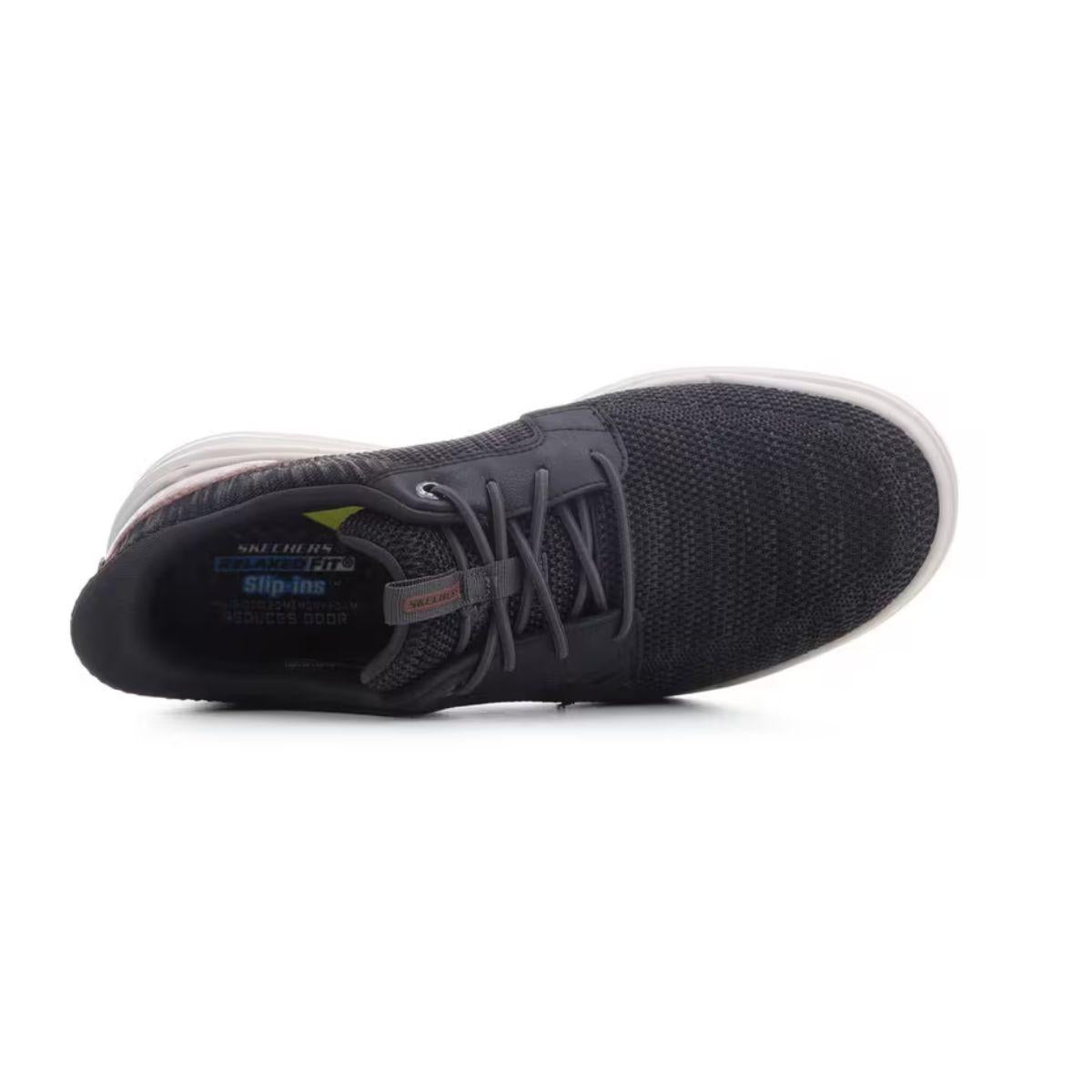 Top view of a black Skechers Slip-ins Relaxed Fit Sterling - Ramone men’s athletic sneaker with a white sole, featuring a mesh upper, visible SKECHERS branding inside, and designed in a Relaxed Fit for comfortable casual wear.