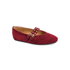 Introducing the All Eyes on Me MaryJane Ballet Flat by CORKY’S FOOTWEAR INC, a cranberry-hued red suede shoe featuring a pointed toe and two decorative buckled straps across the upper.