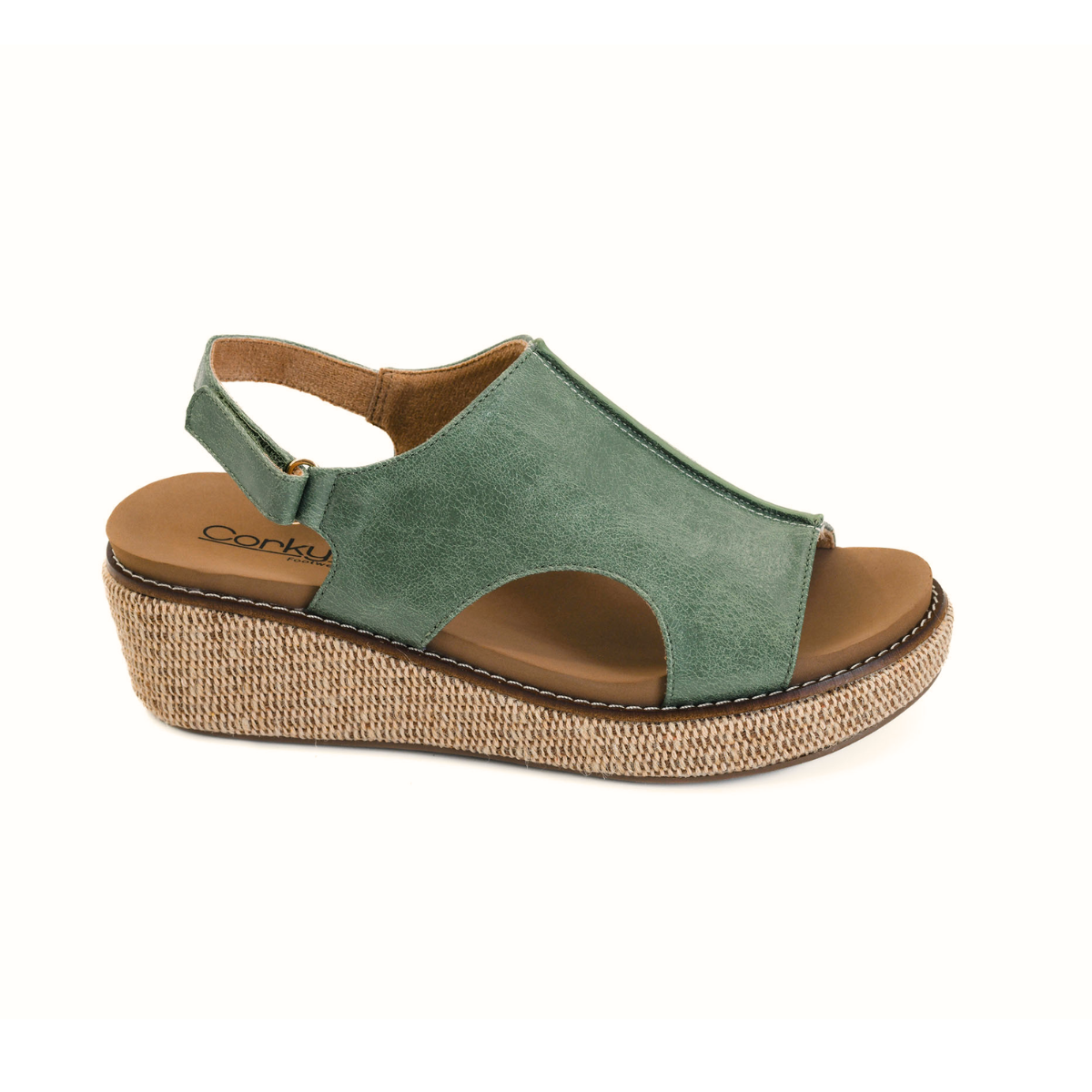 The Volta II Low Wedge in Leaf Green by CORKY'S FOOTWEAR INC features an open toe, closed upper, cushioned footbed, slingback strap, and tan platform wedge with a woven texture. Main image