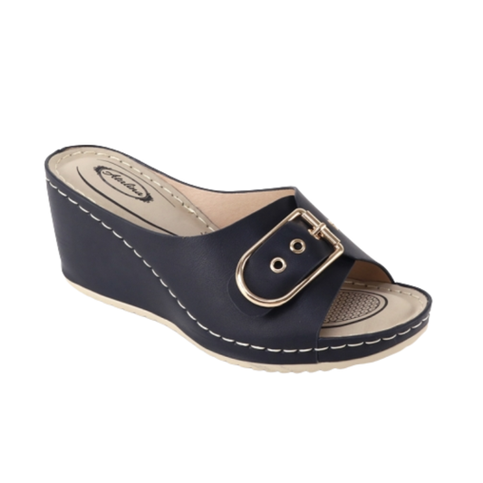 The SUMMER RIO Buckle Accent Slide Wedge Sandal features navy blue color, white stitching, an open toe, and a large gold buckle—ideal for anyone seeking chic summer wedges or classic style shoes.