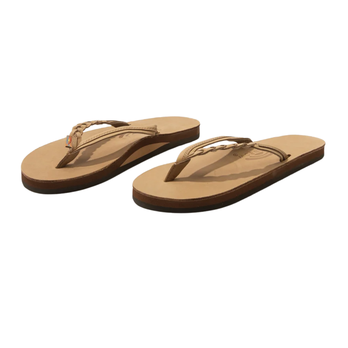 The Flirty Braidy Rainbow Flip Flop in Sierra Brown by RAINBOW SANDALS features tan leather, braided straps, and flat soles, displayed on a white background. Main image