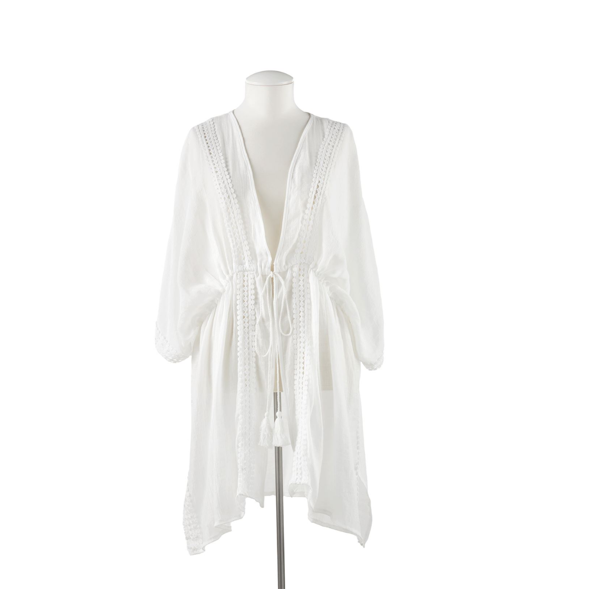 The Gift Craft Swimsuit Cover Up in White, featuring long sleeves, a V-neck, knee-length cut, and a waist tie, is shown on a plain mannequin against a white background. Main image