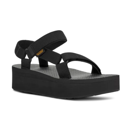 The Deckers Teva Flatform Universal Sandal in black features adjustable recycled polyester straps and a thick, textured sole, shown on a white background.