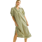 A person wears the Umgee Olive Striped Midi Dress with puff sleeves, collar, front slit, and side pockets, standing against a plain white background—a fresh take on timeless style.