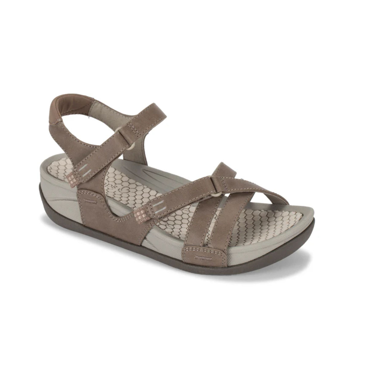 The Danny Sandal by baretraps is a brown, open-toe sandal with adjustable straps and a textured, light-colored footbed for comfort and arch support.
