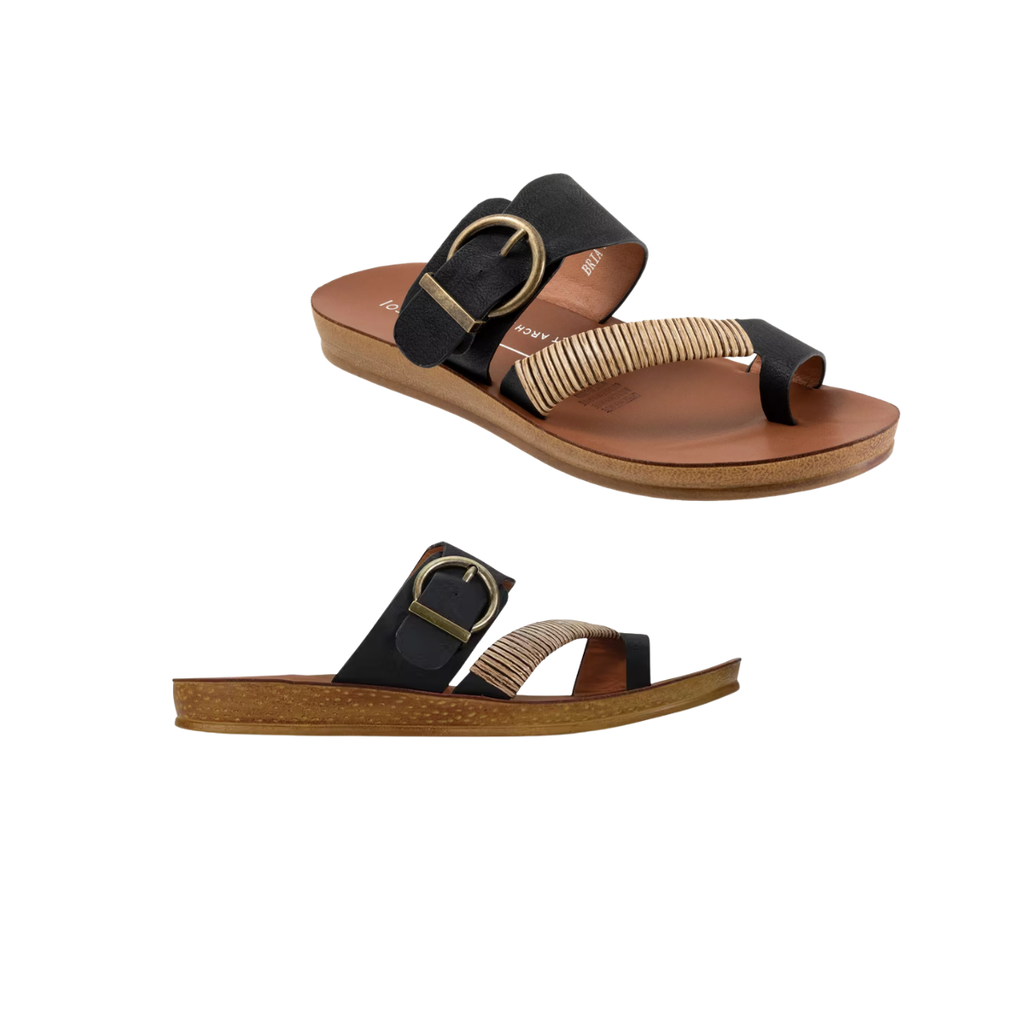 Los Cabos Bria Sandals feature a tan footbed, black straps, a large gold buckle, and a beige-and-white striped band with a stylish woven bamboo wrap—ideal for pairing with your favorite summer styles.