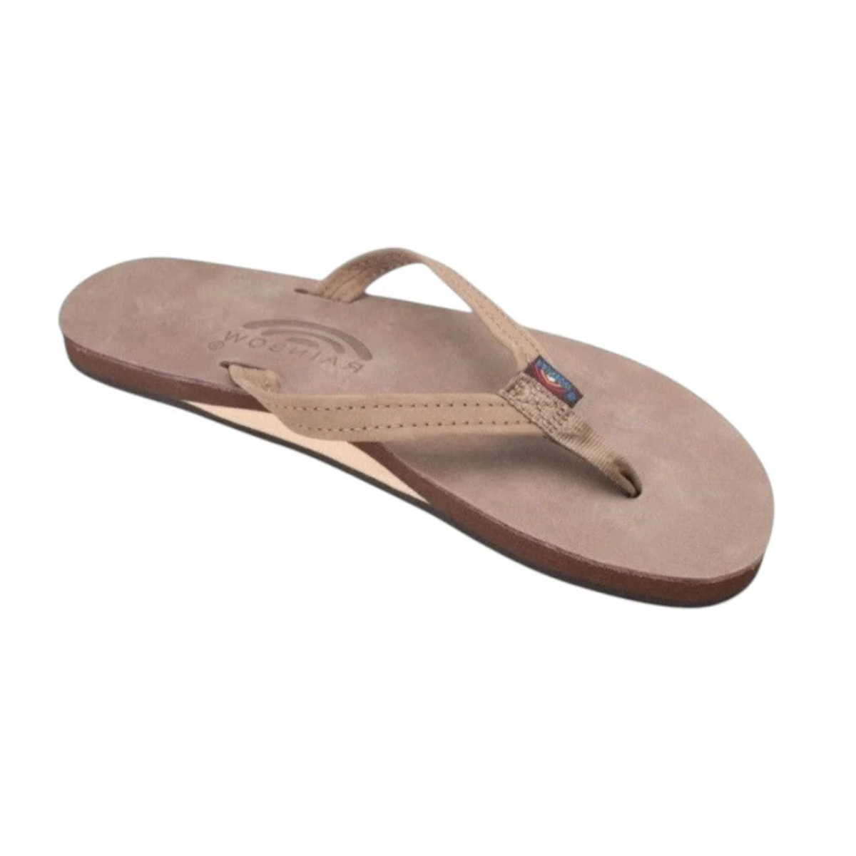 A Ladies Rainbow Sandals Single Layer Narrow Strap in dark brown by RAINBOW SANDALS is shown, featuring a fabric thong strap, single layer arch, and flat sole against a white background.