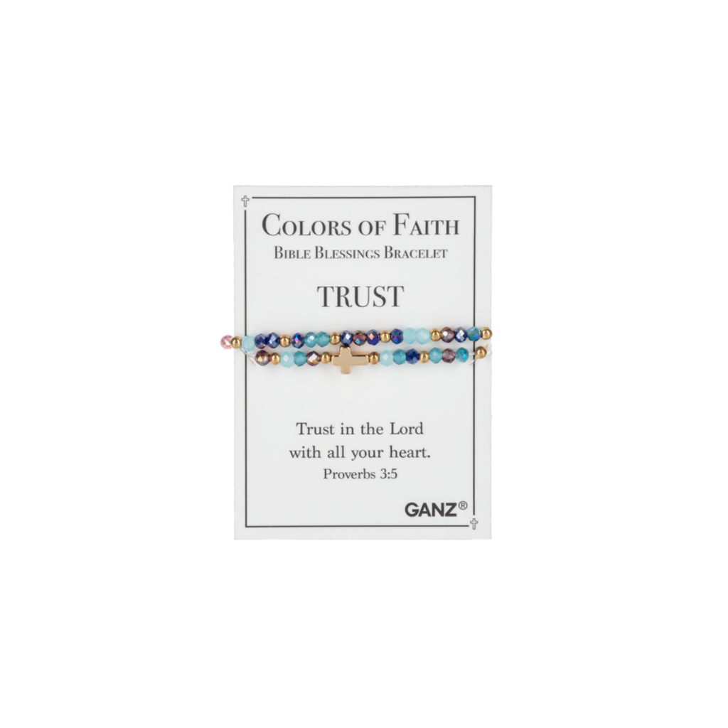 A multicolored beaded bracelet with a cross from Flipflops & Whatnots’ Blessing Bracelets - Assorted collection is displayed on a card reading “Colors of Faith Bible Blessings Bracelet: TRUST. Trust in the Lord with all your heart. Proverbs 3:5.” This inspirational jewelry piece serves as a daily reminder of trust and faith.