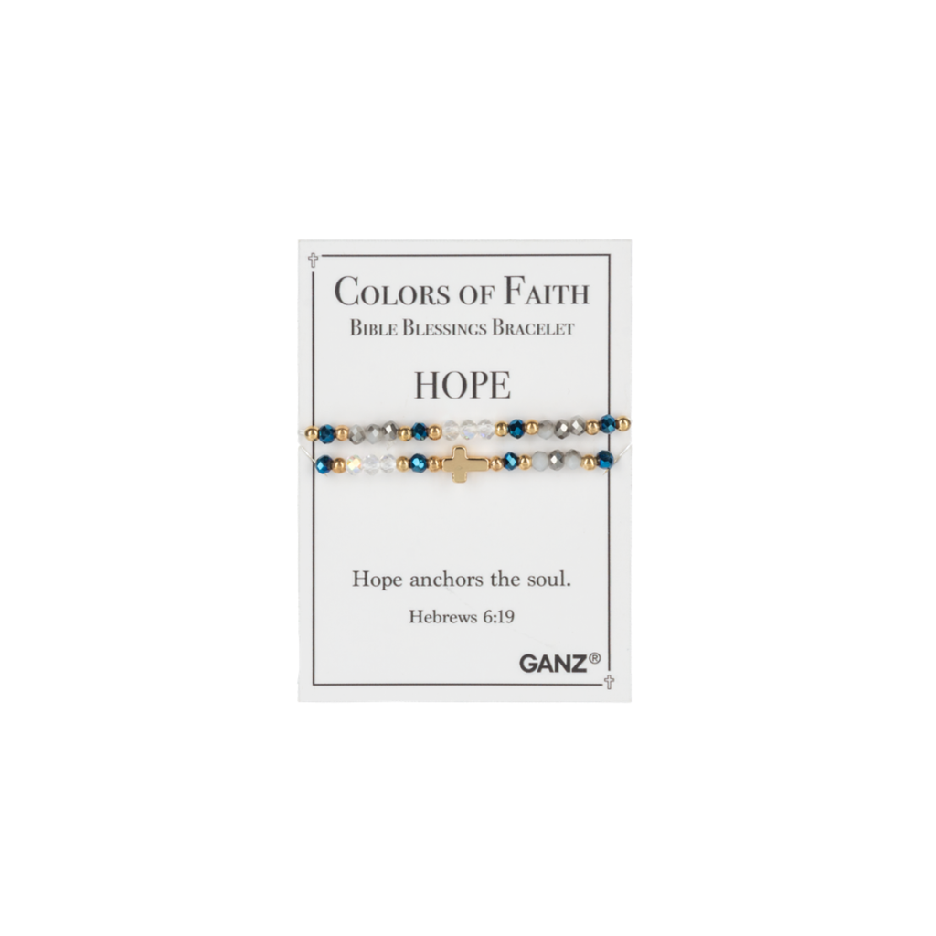 A beaded bracelet featuring a gold cross is presented on a card that reads “Colors of Faith Bible Blessings Bracelet HOPE,” with an inspiring Bible verse and the Flipflops & Whatnots brand name at the bottom, making it a beautiful addition to any faith jewelry collection or selection of Colors of Faith bracelets from the Blessing Bracelets - Assorted line.