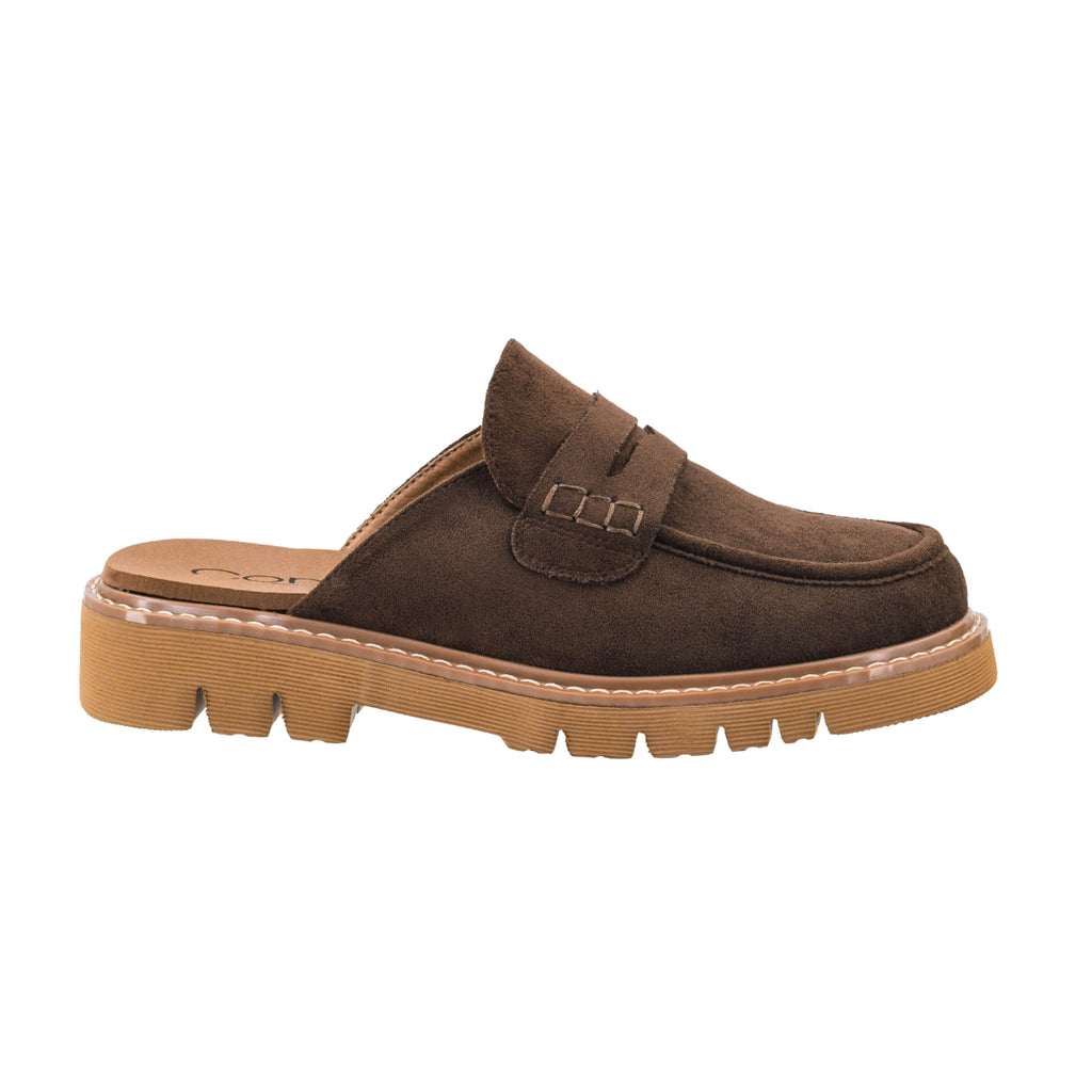 The CORKY’S FOOTWEAR Get Lucky Backless Mule - Clog is a brown suede, loafer-inspired slip-on shoe featuring a tan chunky rubber sole, visible stitching details, and an open back with no heel, shown here in a side profile view.