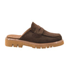 The CORKY’S FOOTWEAR Get Lucky Backless Mule - Clog is a brown suede, loafer-inspired slip-on shoe featuring a tan chunky rubber sole, visible stitching details, and an open back with no heel, shown here in a side profile view.