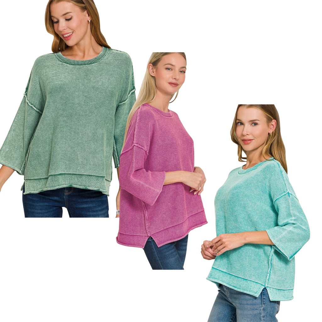 Three models wearing Women’s Washed Cotton Boxy Sweater with 3/4 Sleeves in olive green, magenta, and teal, featuring exposed seams.