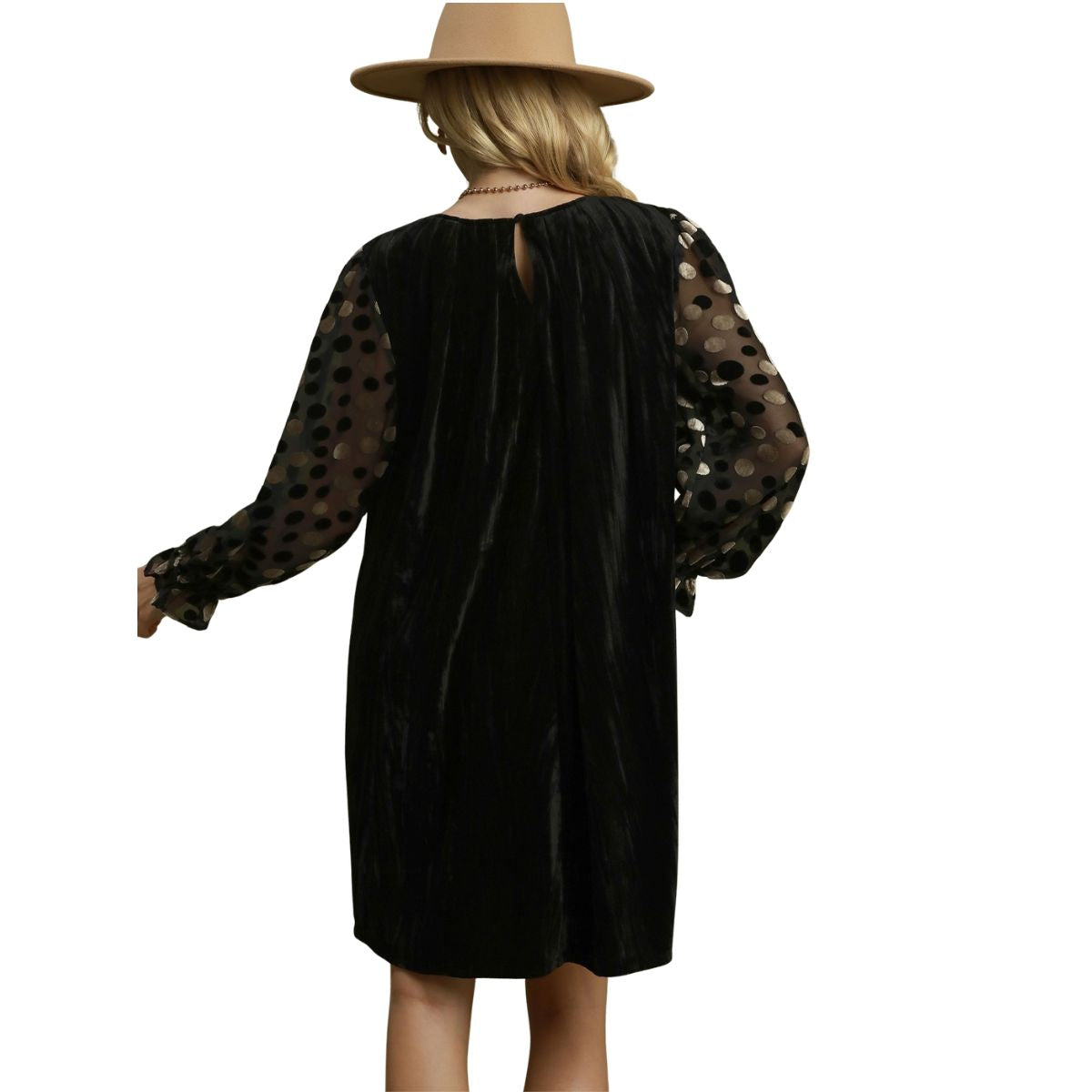A woman is shown from the back against a white background wearing the Umgee Velvet Polka Dot Sheer Sleeve Dress and a tan hat.