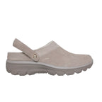 Introducing the SKECHERS Easy Going Distinctive Charm—a beige suede slip-on mule with a slingback strap and thick, treaded sole. This Relaxed Fit clog features the Skechers logo on the side and is designed with Air-Cooled Memory Foam for all-day comfort.