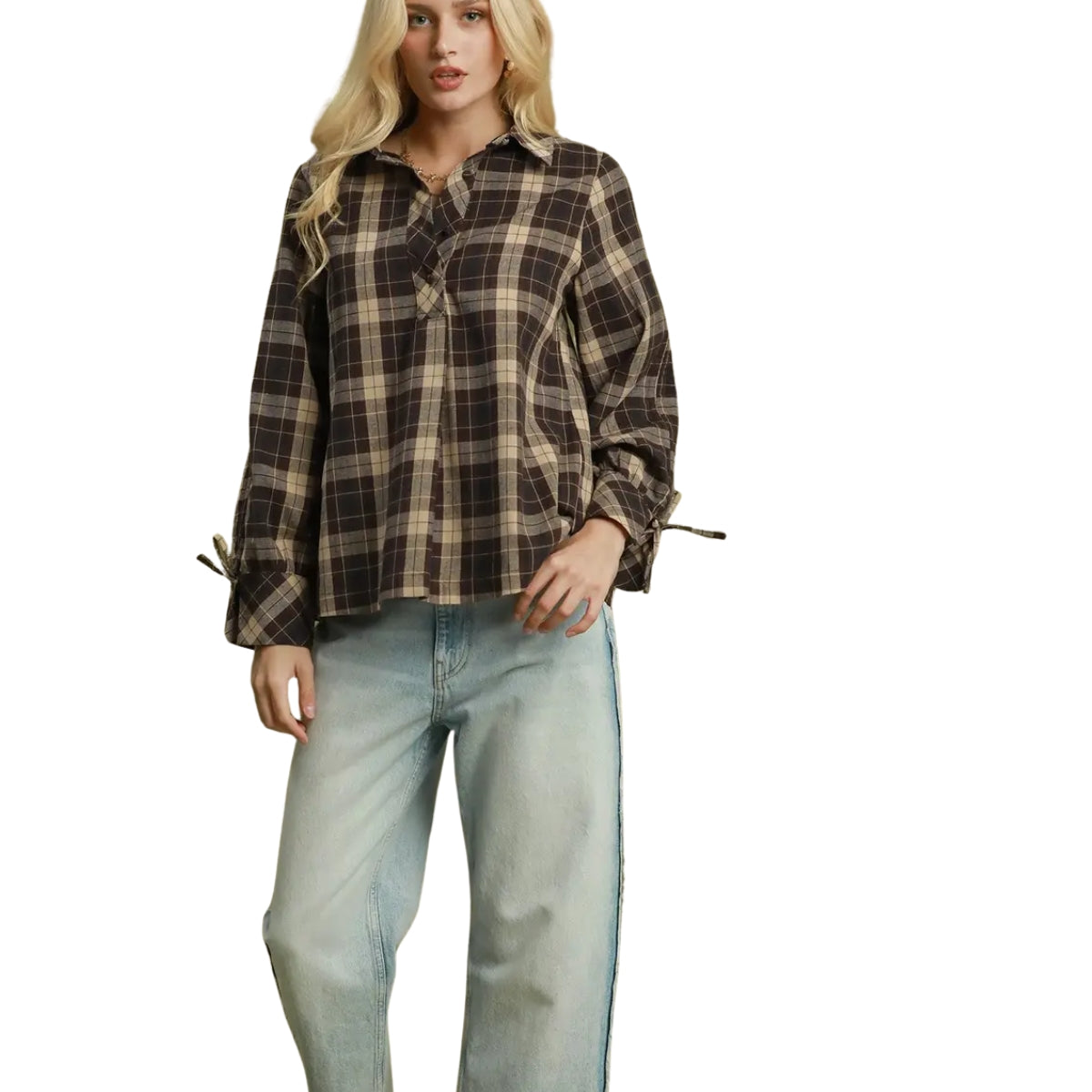 Woman wearing a brown and tan Plaid Tie Sleeve Button Up Blouse with light-wash jeans. Main image