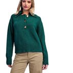 A person wears an eesome Collared Sweater in forest green, featuring a button-front design and long sleeves.