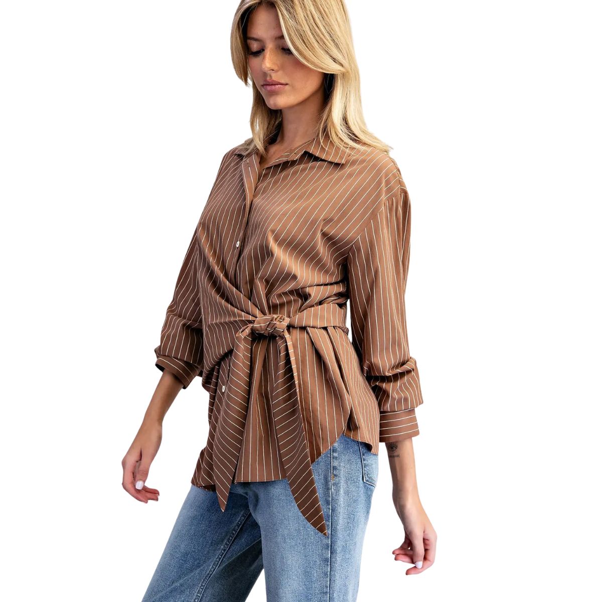 A woman wears an eesome Tie Waist Pinstriped Blouse in brown with a button-front, tie waist, and blue jeans.