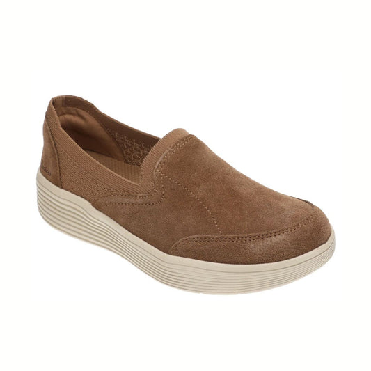 The Women's Archfit Laguna Subtle Spice Slip On Wedge by SKECHERS USA INC is a brown suede slip-on with podiatrist-certified support, a textured sole, and elastic side panels, shown on a white background.