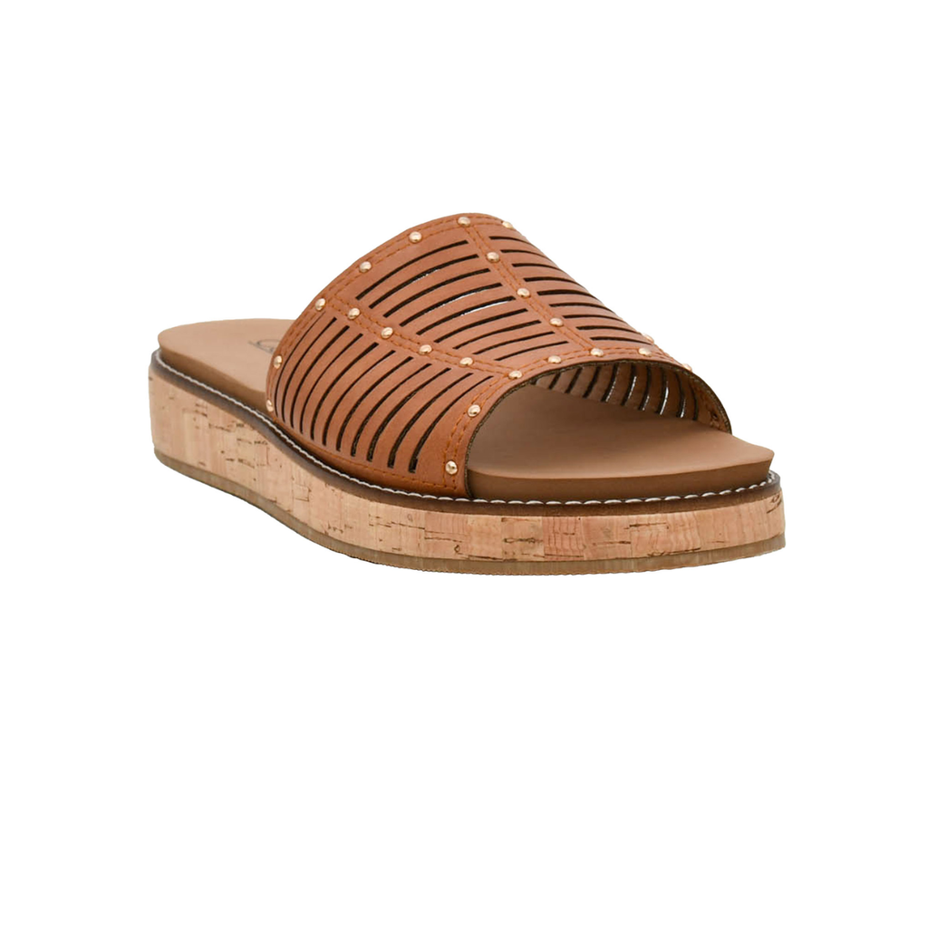 The At Ease Low Platform Slide Sandal by CORKY'S FOOTWEAR features a brown open-toe slip-on style with cutout design, stud accents, and a cork platform sole—shown on a white background.