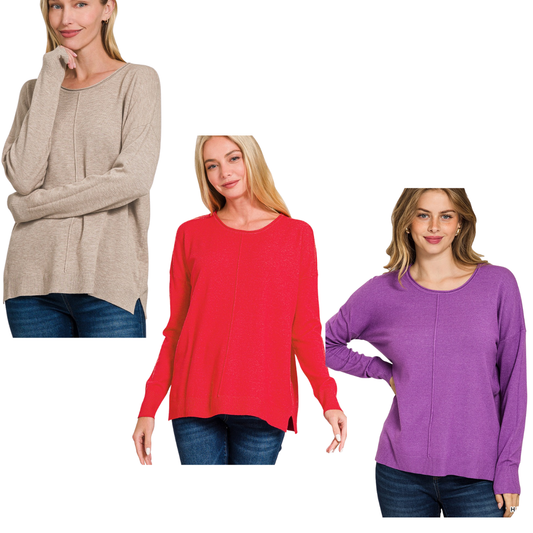 Three women wear FASHION GO Viscose Front Seam Round-neck Sweaters in beige, red, and purple with blue jeans, standing against a white background.
