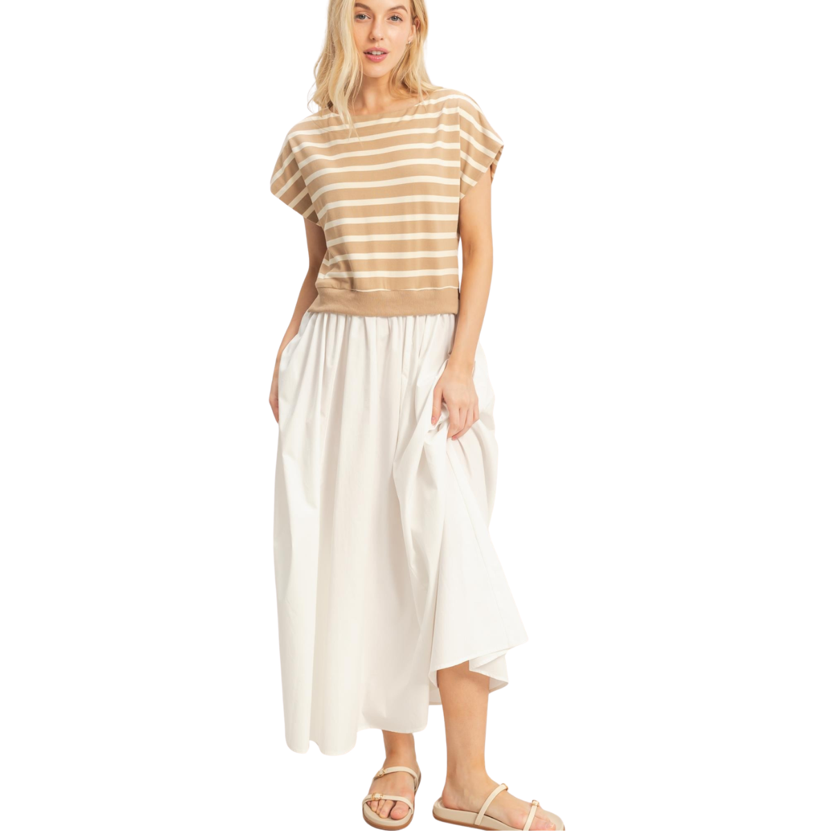 A woman wearing the Fashiongo Striped Short Sleeve Midi Dress stands against a white background, one hand in her pocket.