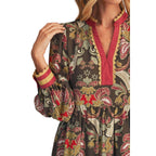 A woman is seen wearing the FASHION GO Puff Shoulder Baroque Floral Midi Dress, featuring long sleeves with ruffled cuffs, red trim, and a patterned design in shades of red, yellow, green, and brown. Only her upper body is partially visible.