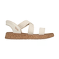 The SKECHERS Slip-ins: BOBS Sun Vibe - Island Stroll is a beige sandal with textured fabric straps, cushioned footbed, and cork-textured sole, shown in side profile against a white background.
