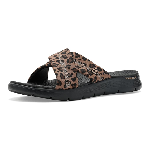 The SKECHERS Go Walk Flex Sandals in Leopard feature black slip-on comfort, crisscross leopard-print straps, and a textured footbed—ideal for anyone seeking a stylish and comfortable leopard print sandal.