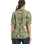 Women's floral print blouse with split V-neck, scalloped yoke and short puff sleeves