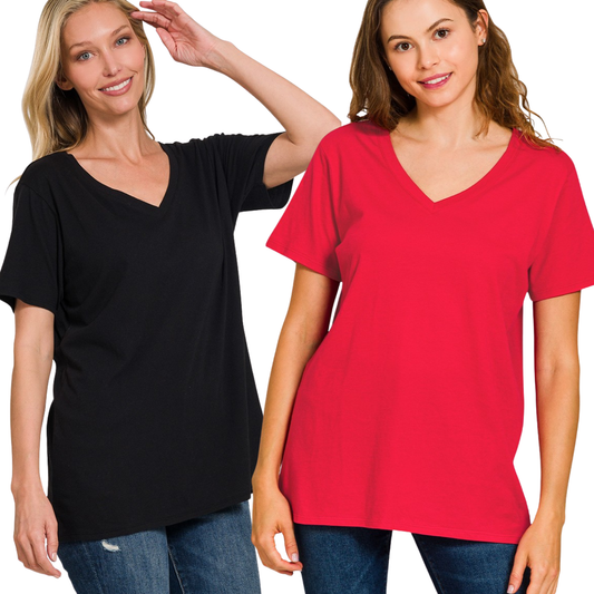 Two women stand side by side against a white background, each wearing a FASHION GO Boyfriend V-Neck Tee in 100% cotton—one in black, one in red—styled with jeans for an easy, casual look.