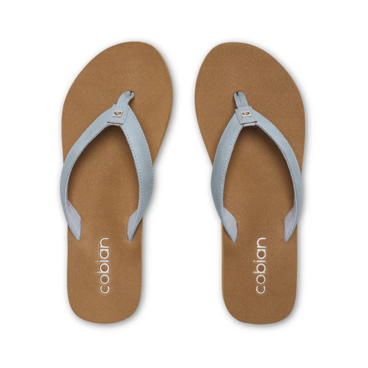 A pair of Cobian Skinny Bounce 2 Flip Flops in blue by COBIAN, featuring light blue straps and the brand name printed in white on the cushioned footbed for lightweight comfort.