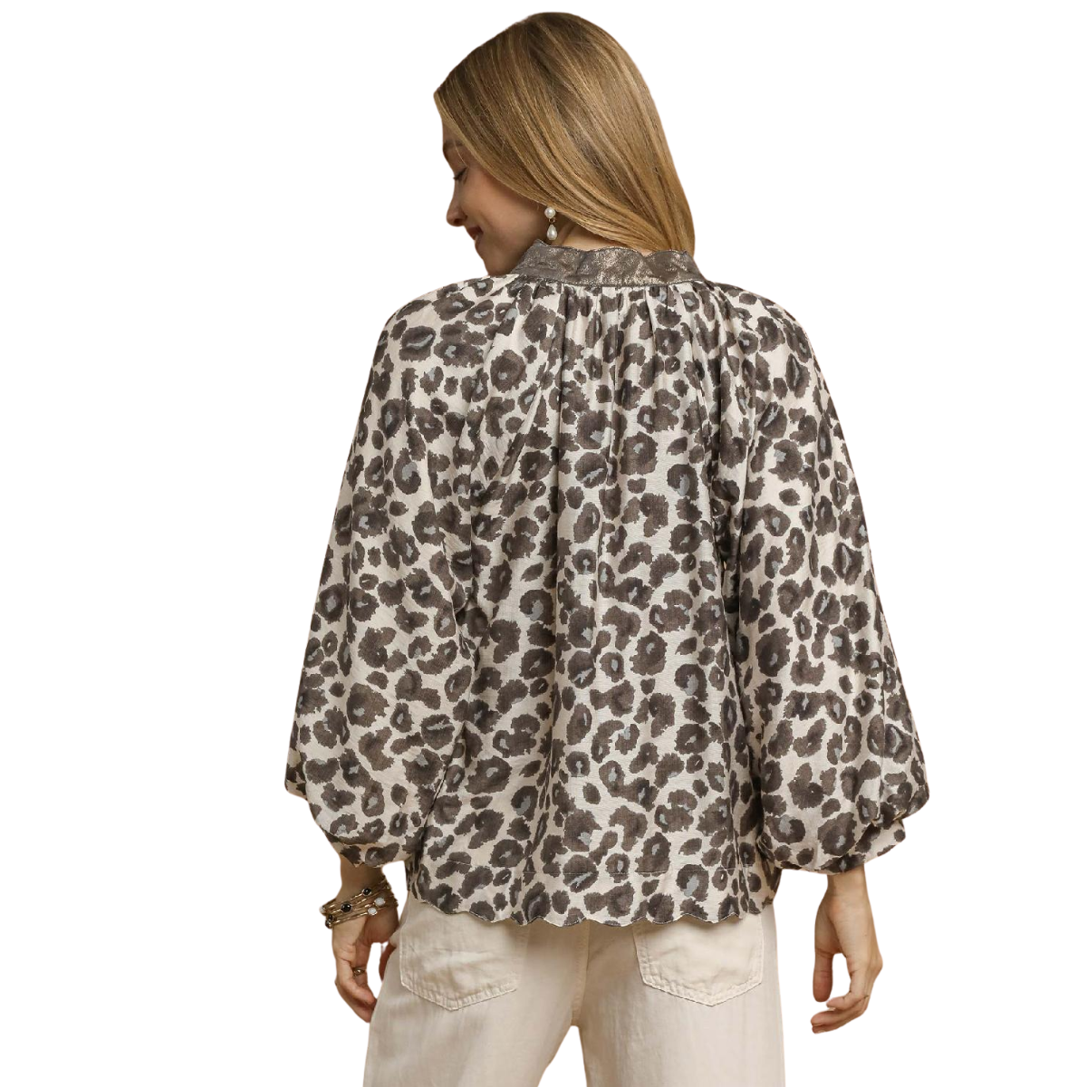 A woman is shown from the back wearing the Umgee Leopard Print Boho Top in Black with cream-colored pants, set against a white background.