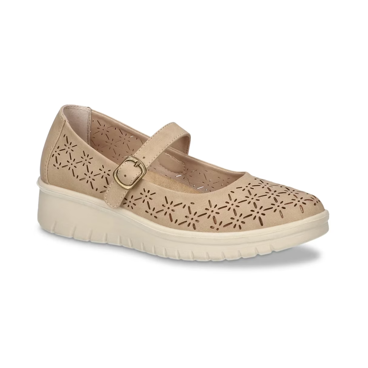 The Gertie Mary Jane Wedge by EASY STREET features a beige upper, thick white sole, floral cut-out patterns, and an adjustable gold-buckle strap—ideal for women seeking both comfort and style.